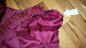 Folded down cut off front strap . . at base of neck.