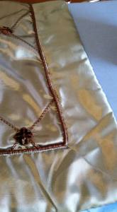 I cut the top edge off right under the brown piping.