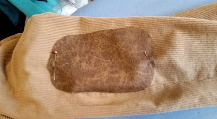 "leather" patches added to the sleeves