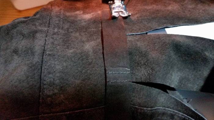 reinforcing the sleeve at the base of the slits