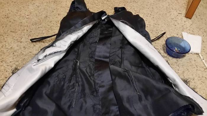 center back seam opened up in the lining, on to the fashion fabric.