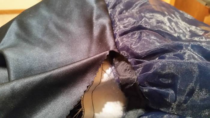 cutting off the flounce with pinking shears