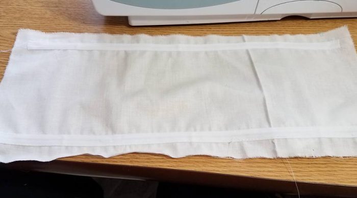 puff backing with two channels for elastic