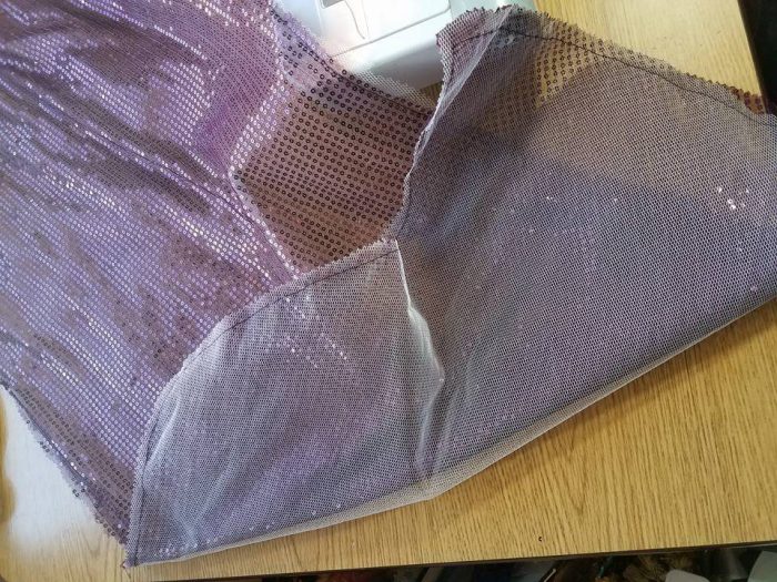 sequin mesh sleeve backed with petticoat net