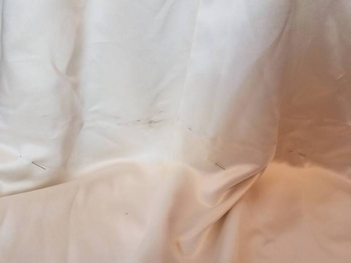 stains along floor line left from bustling dress