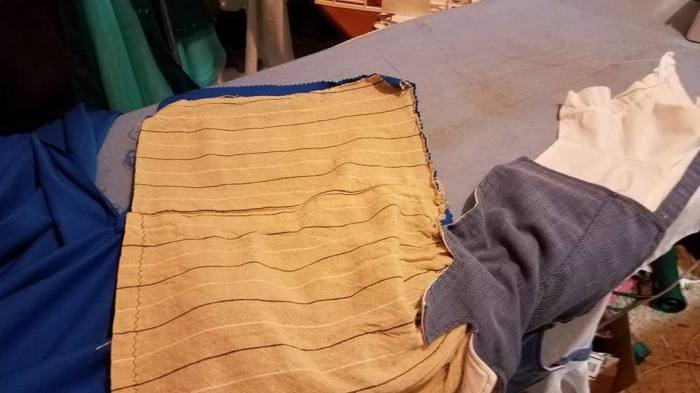 side of transforming top--flap to tuck in on sides