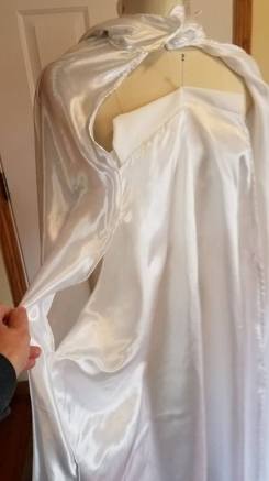 arm hole opposite tie slit