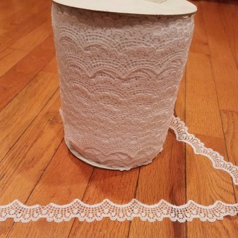 400 yards of white scalloped lace