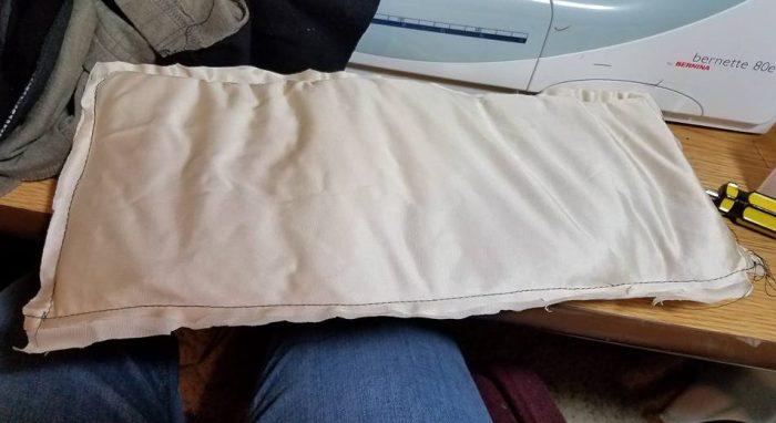 more shoulder padding--encased in tricot knit so it slips