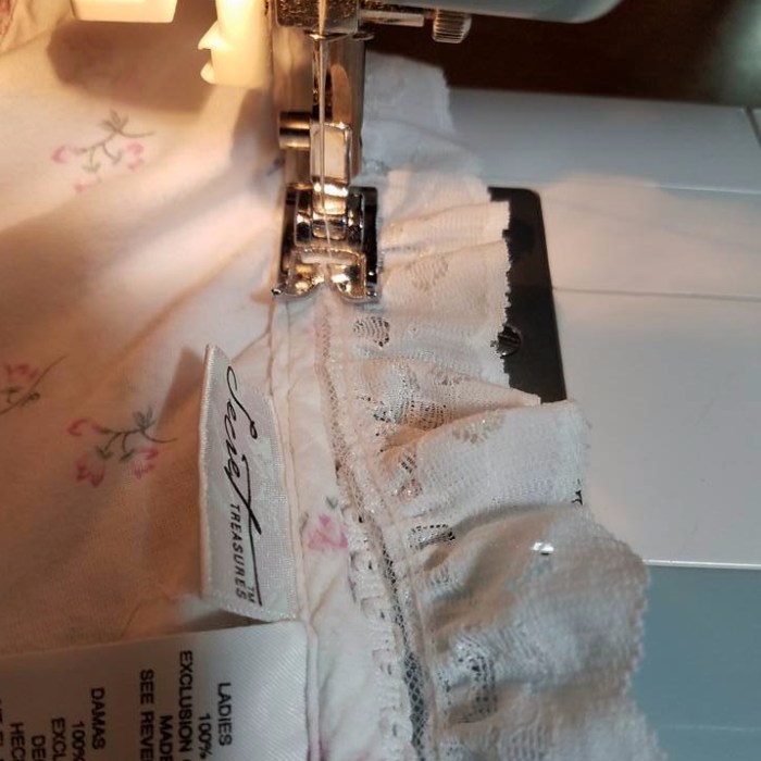 stitching lace on to the neckline