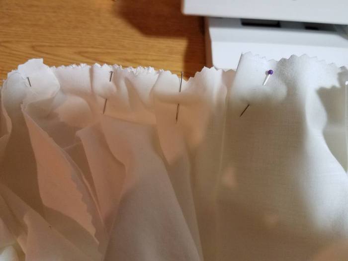 pleat the skirt on to the lower edge of the shirt