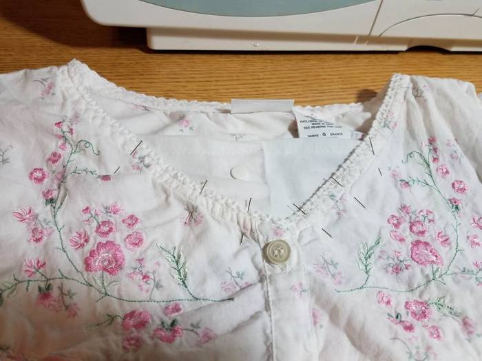 insert a piece of the lab coat into the neckline