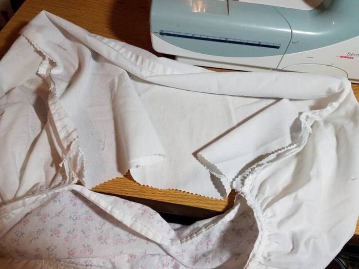 a piece of the lab coat inserted into the ruffle--squish gathered in