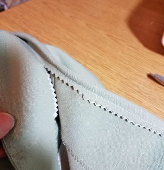 trimming out excess lapels . . . maybe  trimmed a bit short