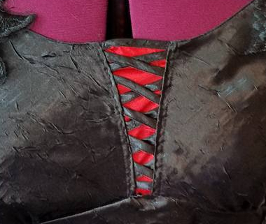 red satin added to neckline