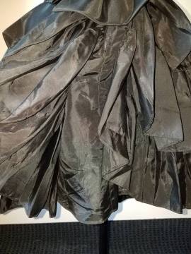 back of skirt, ruffles raise at center back