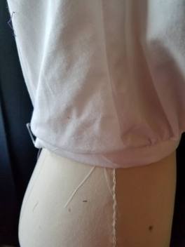 band at the bottom of the blouse