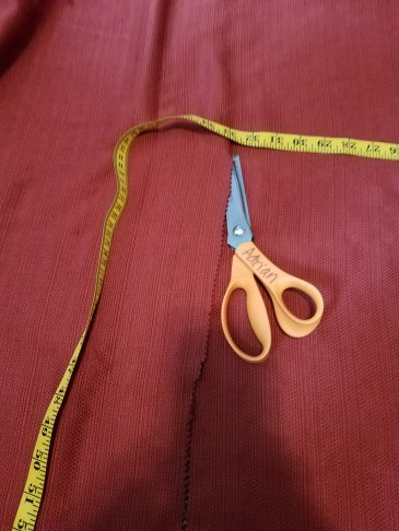 cutting the skirt tablecloth in thirds