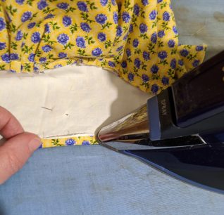 press raw edges of brim 1/4", costumecrazed.me hat